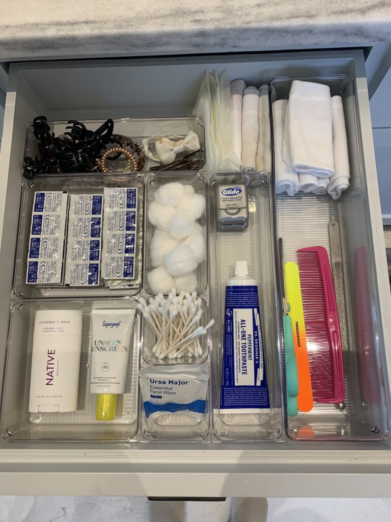 BATHEROOM DRAWER NEATLY ORGANIZED WITH SEPARATORS