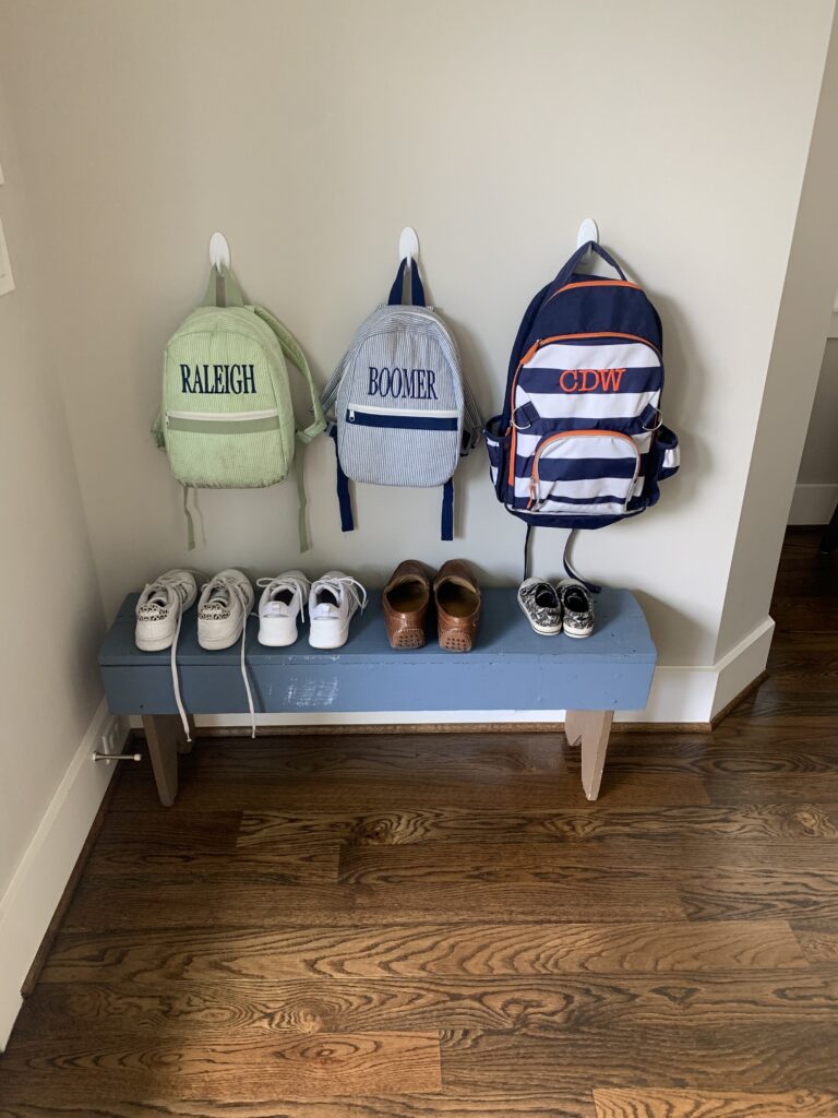Backpack hooks and shoe bench landing zone in a Houston home, Wildely Organized
