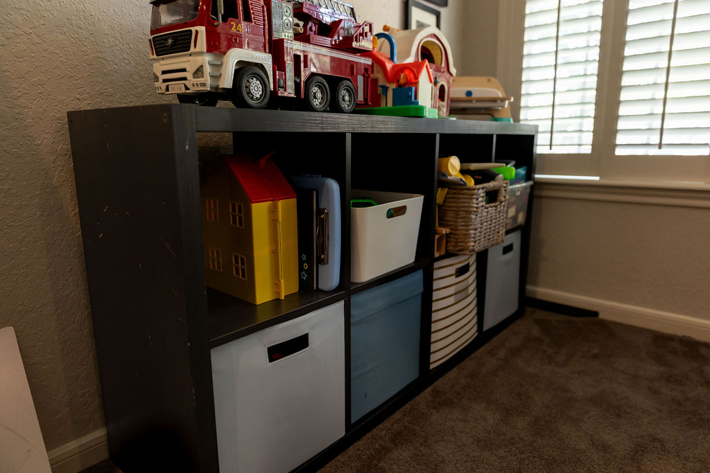 Playroom organization in Houston TX by Wildely Organized, low labeled bins at child height